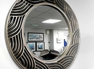 Artisan Home Interiors - Circular antique silver leaf finish Mirror